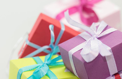 four gift-wrapped boxes